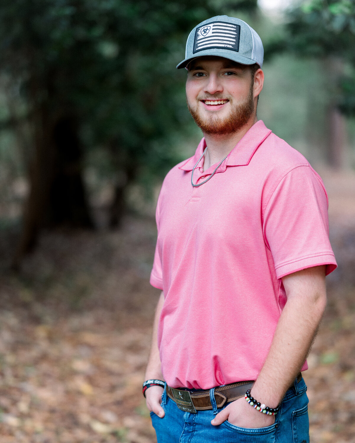 Young man's image captured for senior portrait session along the Flint River in Bainbridge. By Photography by LV Hughes. Serving Bainbridge, Tallahassee, and surrounding areas. 