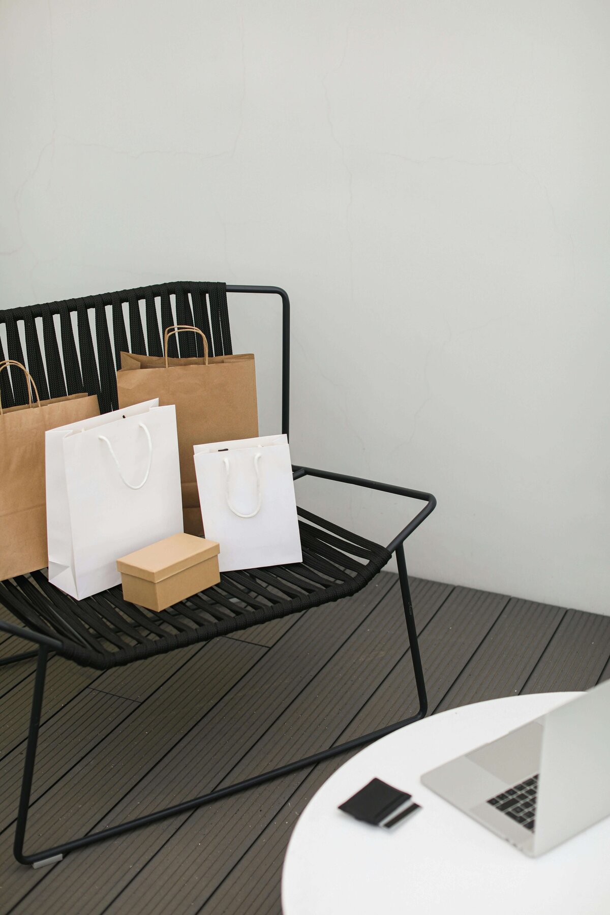 shopping bags on a patio chair