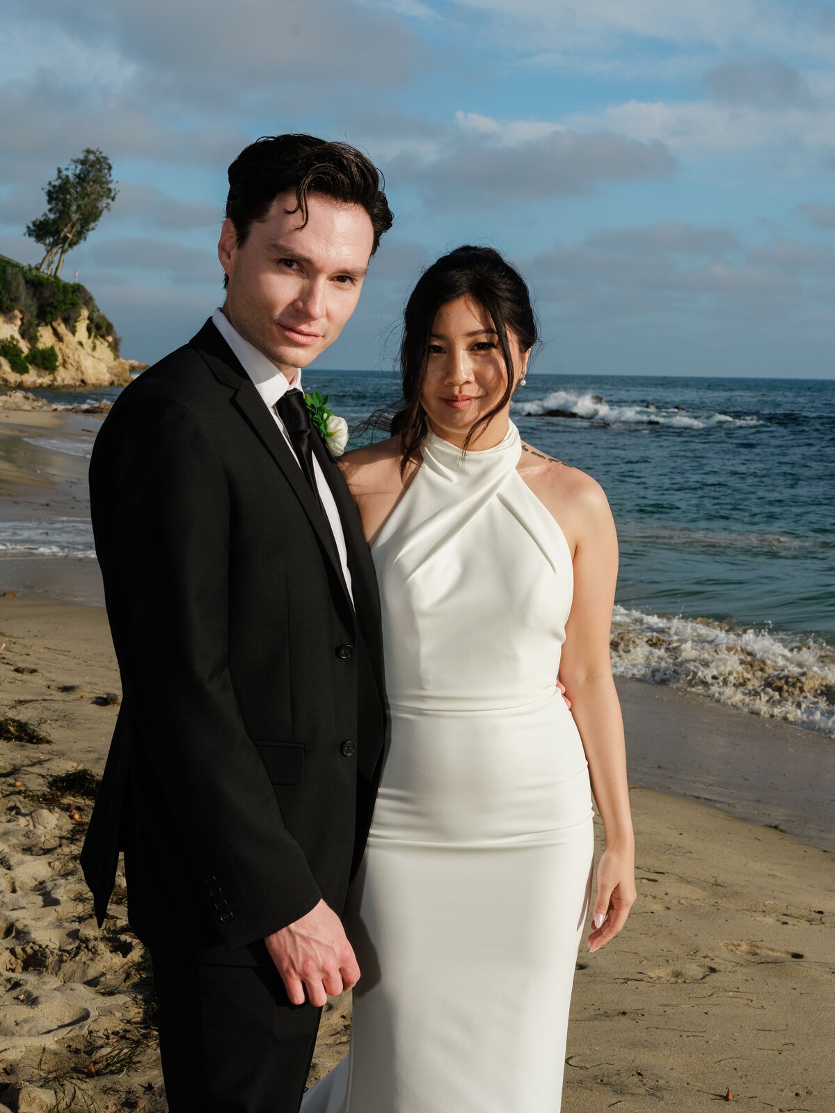bride and groom portraits on the beach in Southern California