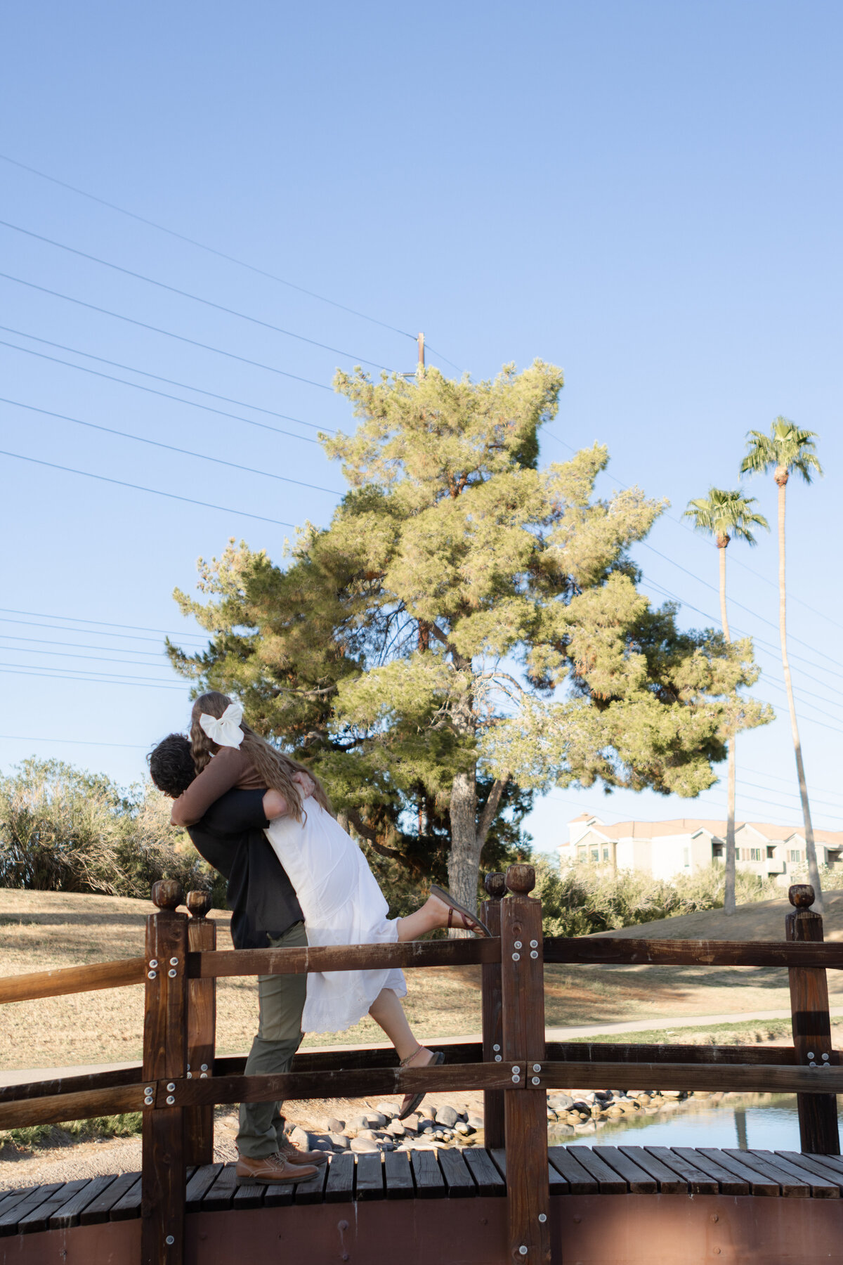 Jovanna G Photography. Classic, sophisticated Wedding Photos. Soft romantic engagement photos. Soft romantic WeddingPhotos. Sophisticated Wedding Photographer. Professional Wedding Photographer. Destination Wedding Photographer. Luxury Wedding photographer. Traveling Wedding Photographer. AZ Wedding Photographer. Gilbert AZ Wedding Photographer. Queen Creek Wedding Photographer. Phoenix Wedding Photographer. Scottsdale Wedding Photographer. Flagstaff Wedding Photographer. SoCal Wedding Photographer. California Wedding Photographer. Northern California Wedding Photographer. Southern California Wedding Photographer. San Francisco Wedding Photographer. Bay Area Wedding Photographer. San Jose Wedding Photographer. Golden Gate Bridge Wedding Photographer. Beach Lover Wedding Photographer. Palace of the Fine Arts Wedding Photographer. Ocean Lover. I love California. Orange County Wedding Photographer. Newport Beach Couples Photographer. Newport Beach Wedding Photographer. Laguna Beach Couples Beach Engagement Photographer. Laguna Beach wedding beach photographer. Los Angeles Wedding Photographer. Young and in love engaged couples who live in southern California. Christian Young Couple. Young Engaged Couple. Engaged High School Christian Couple. Christian Values. Young conservative Christian women. Young Conservative Christian men. Young Conservative Christian Couple. Young Christian Couple Engaged in High School. Young Christian College Couple. Lakeside Lovers in the Autumn Sun. David & Grace - engagement photos. Jovanna G Photographer Engagement Photos. Arizona sun shining through autumn trees- engagement. Chandler, AZ Engagement Photos. Chandler, AZ 2026 bride. Chandler, AZ Wedding Photographer. Chandler, AZ Young Engaged Couple. Girl in her 20s. Engaged Arizona Girl in her 20s. Lakeside Engagement photos. AZ Lakeside Engagement Photos. AZ Weeping Willow Lakeside Proposal. Arizona Lakeside Proposal with weeping willow tree. Detail shot of engagement ring on Arizona Lakeside estate. Chandler, AZ Lakeside Estate Proposal Outfit Inspiration.
