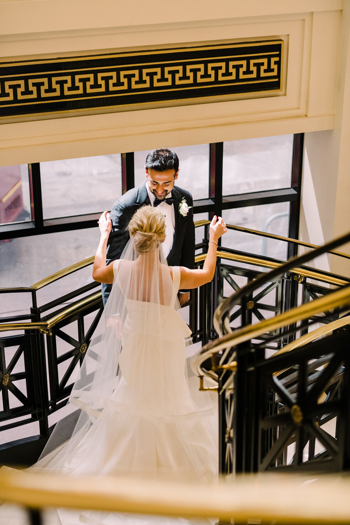 A Chicago wedding couple shares a first look in the Financial District of Chicago