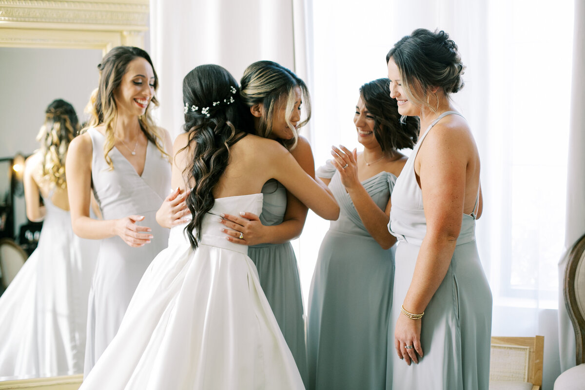 Precious moments between the bride and her maids