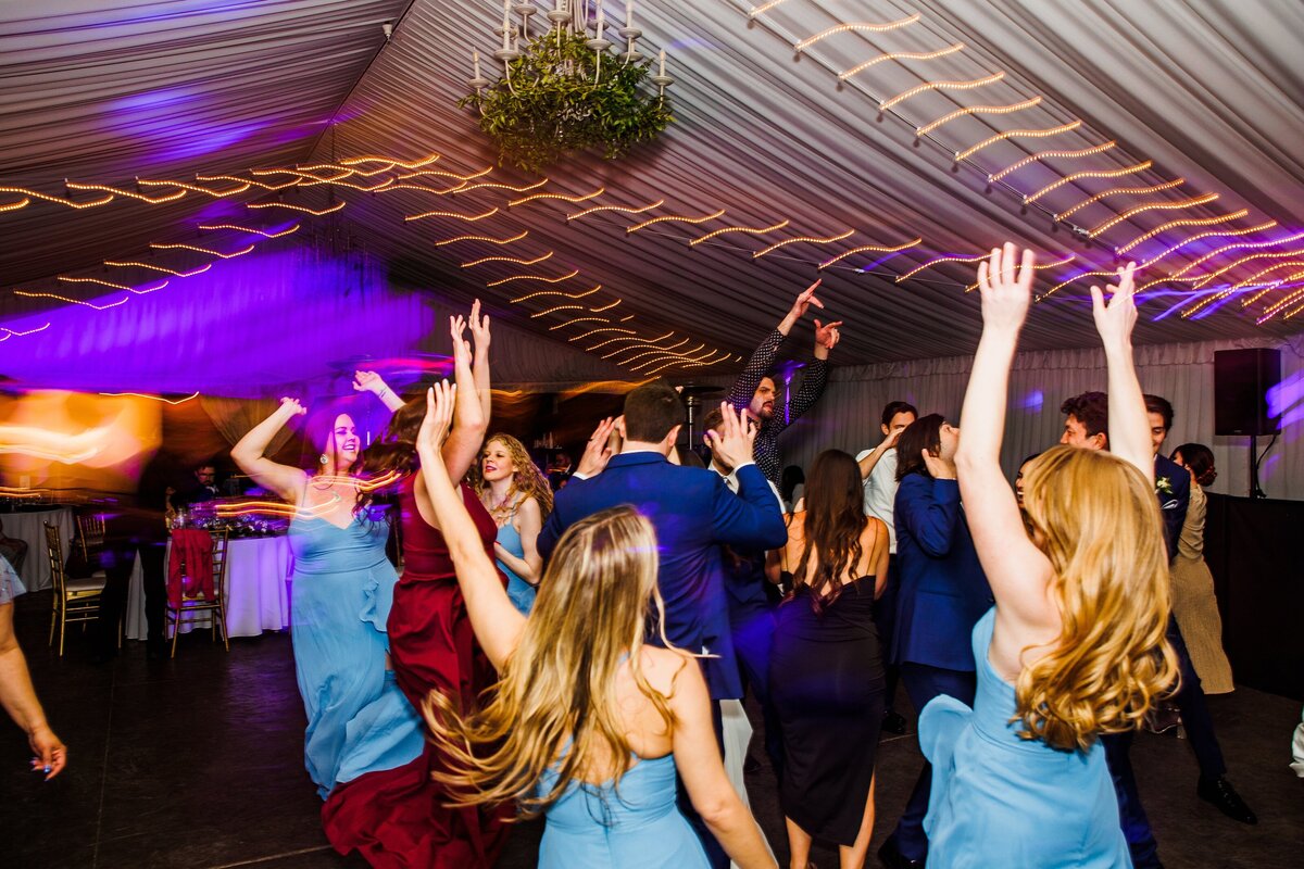 Guests dancing at Stonebridge manor wedding reception lights fun