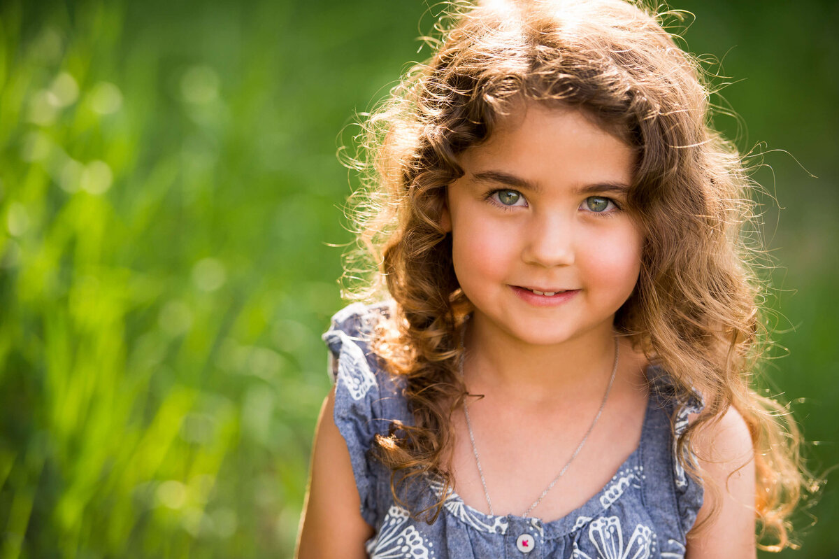 a closeup portrait of a little girl taken by Ottawa Family Photographer JEMMAN Photography