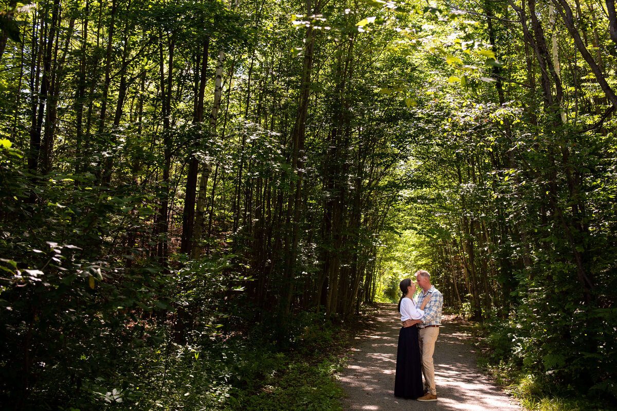 Ottawa Family Photography of mom and dad as a couple taken outdoors in the woods