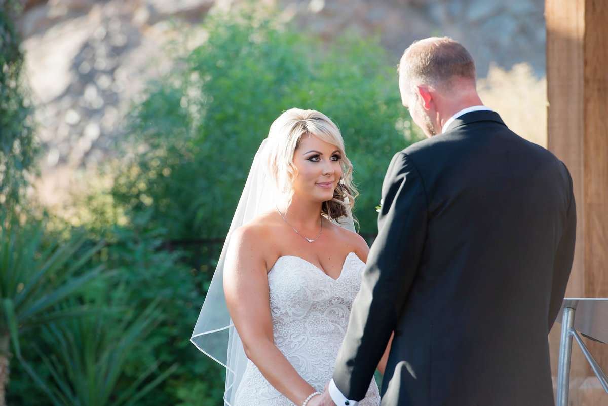 bride and groom during ceremony at From the Farm in Yuma AZ