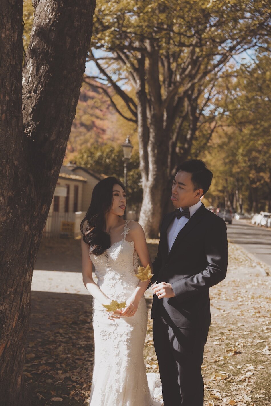 Autumn wedding shoot at Millbrook, Arrowtown. Vintage car & helicopter.
