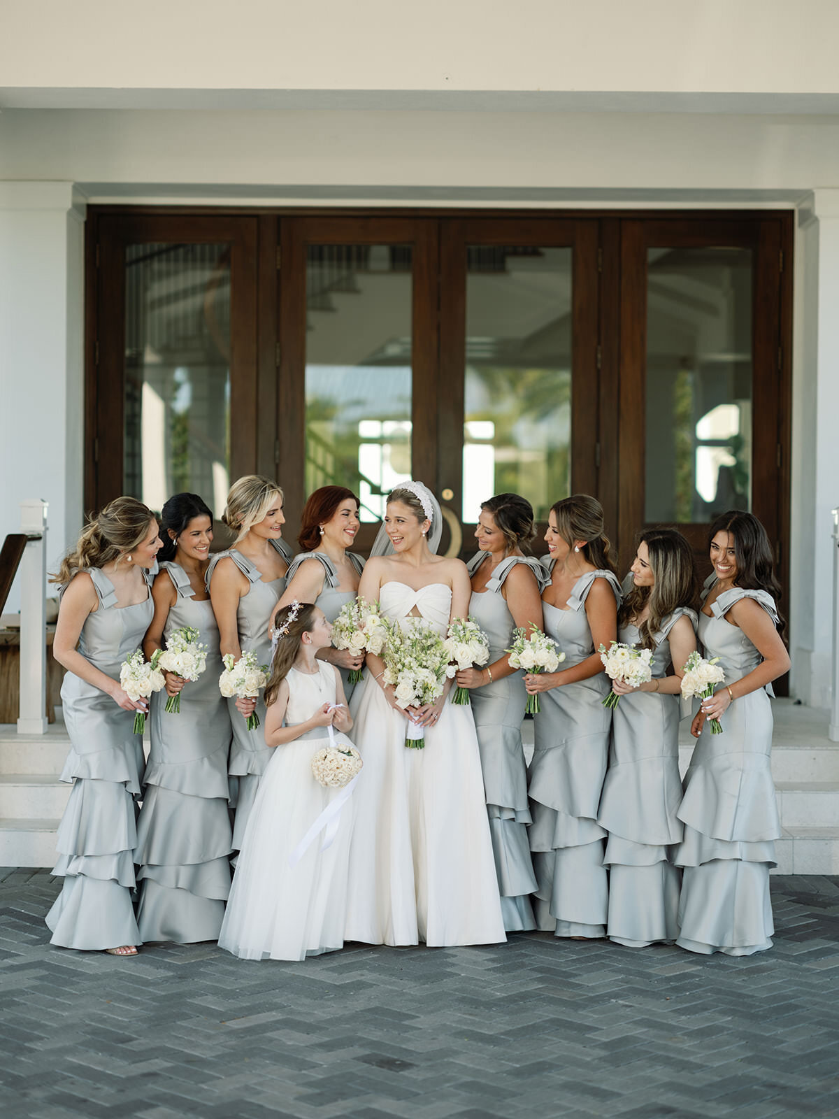 bride-bridesmaids-outside-venue-3GF-W