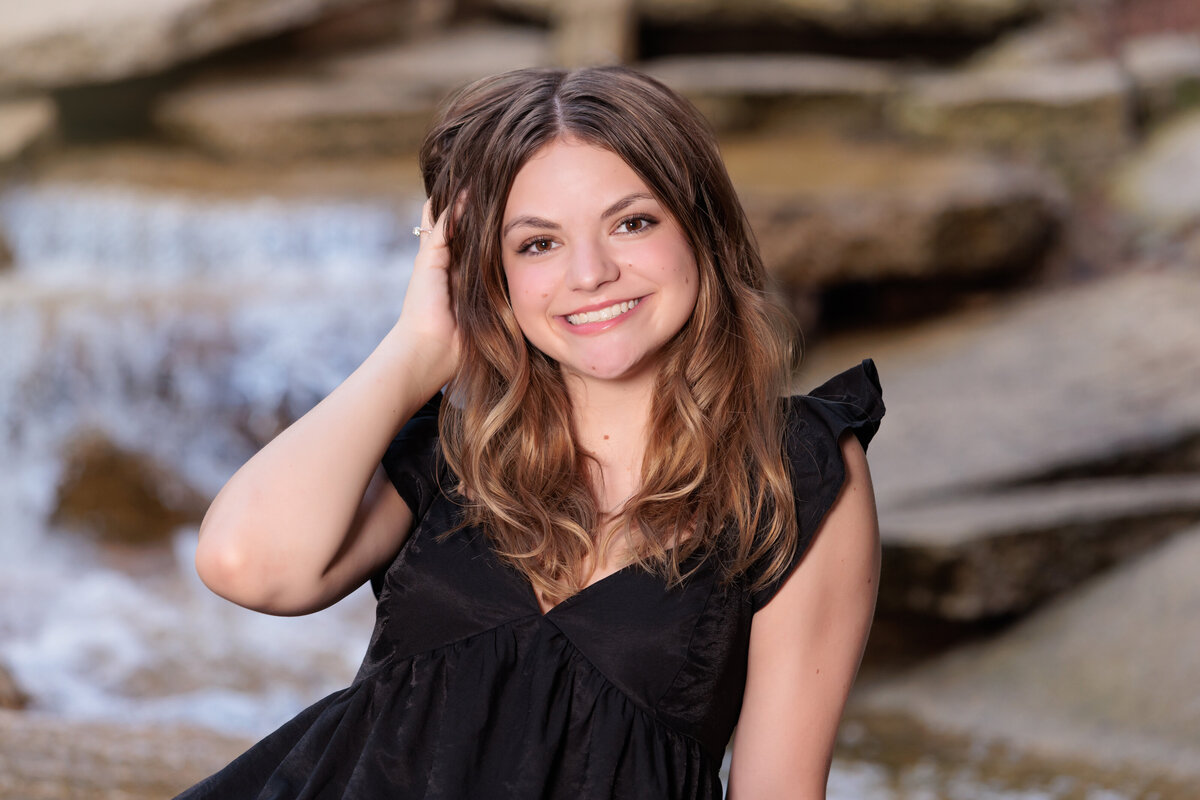 Waterfall background for senior pictures in Durham NC