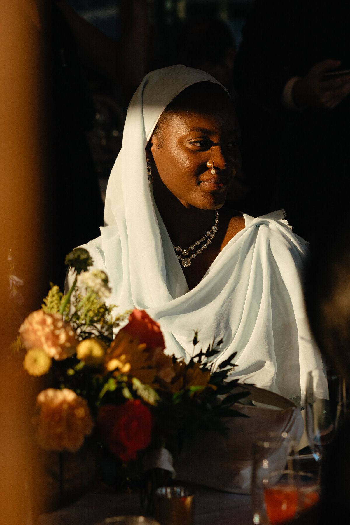 guest sitting at wedding dinner table