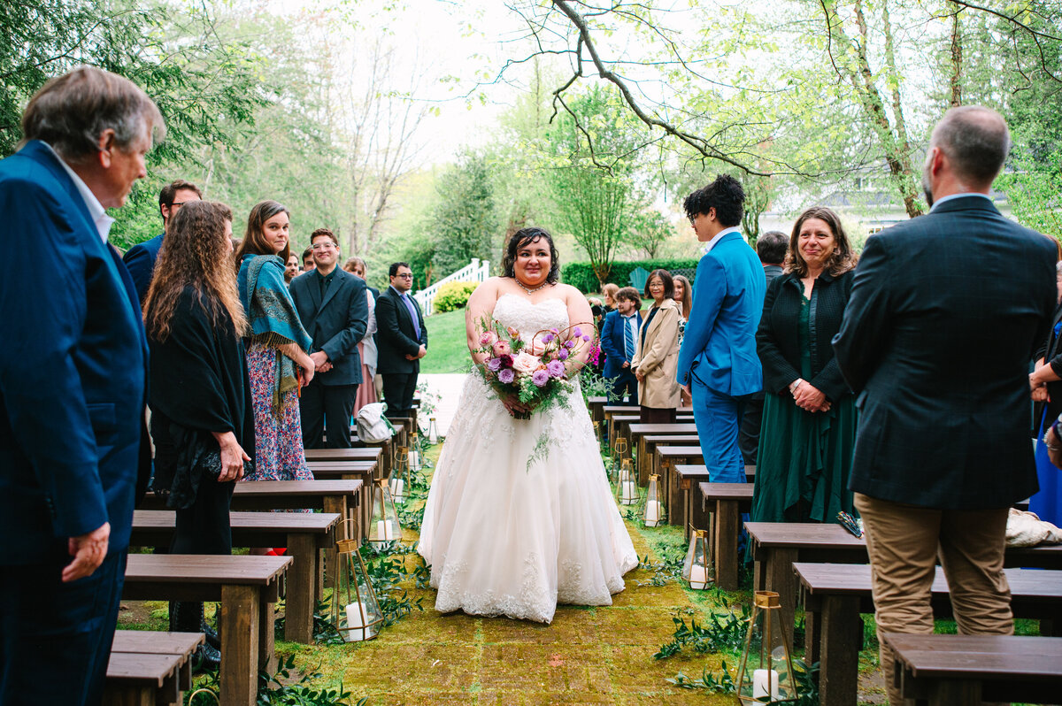 Bride walking to the wedding aisle