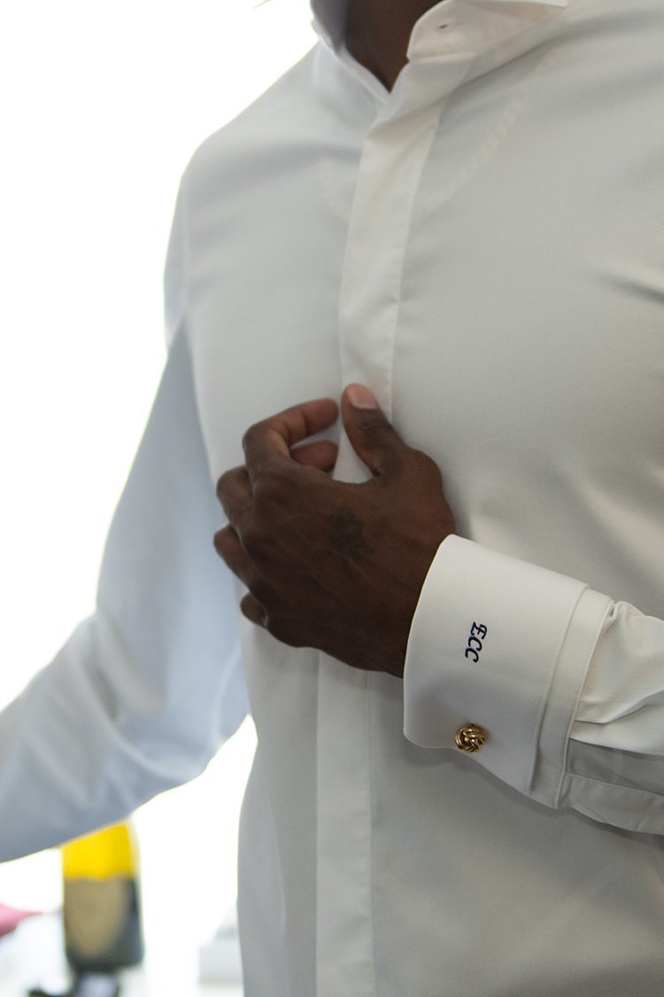 Cuff of Groom's shirt with initials embroidered on the cuff