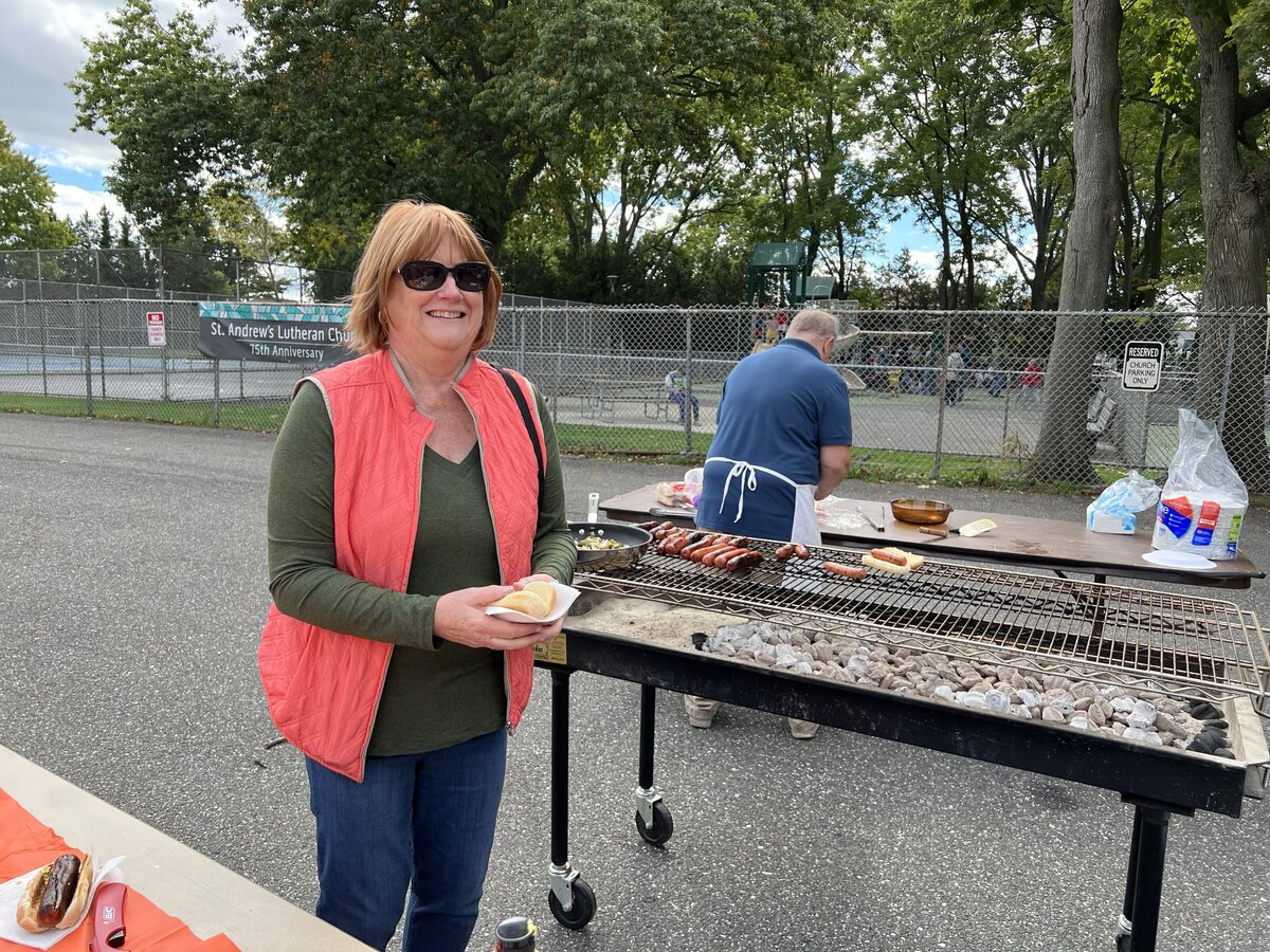 st. andrew's church member enjoying the fall festival