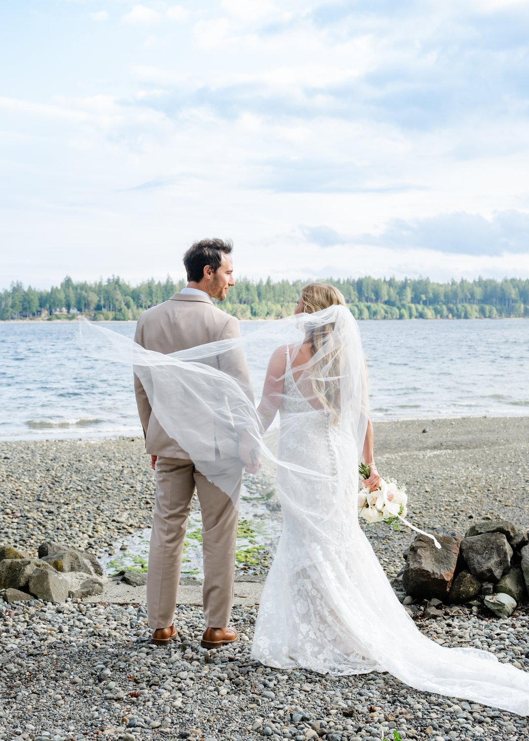 bride and groom portrait olympic peninsula beach wedding looking at water