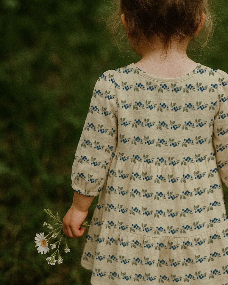 Girl Holding Flowers