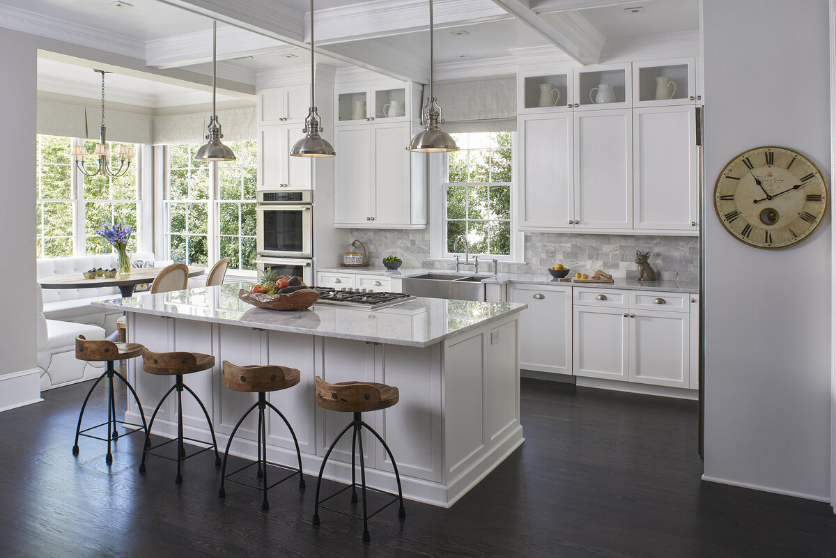Wide View Elegant White Kitchen with Drop Lights + Breakfast Stools