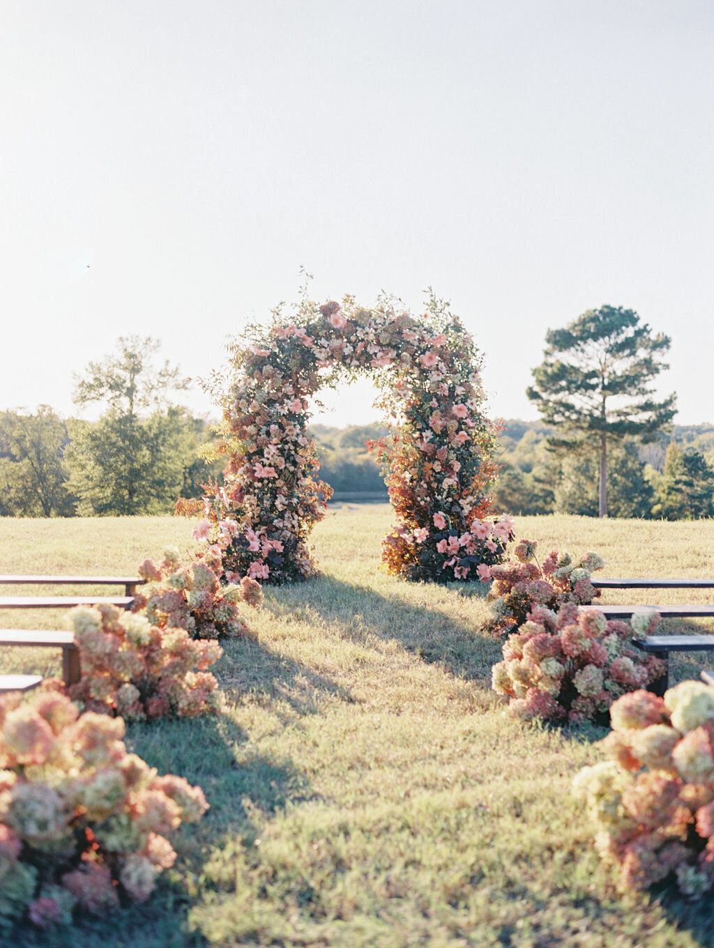 max-owens-fall-wedding-texas-ranch-ceremony-arch