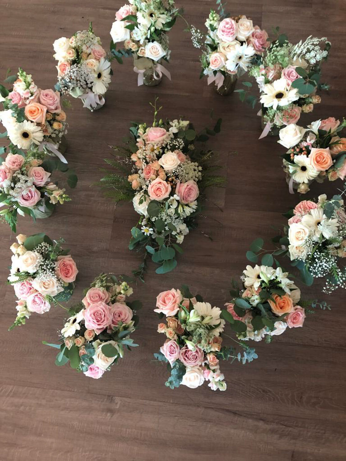 Assorted bridal bouquets arranged in a circle