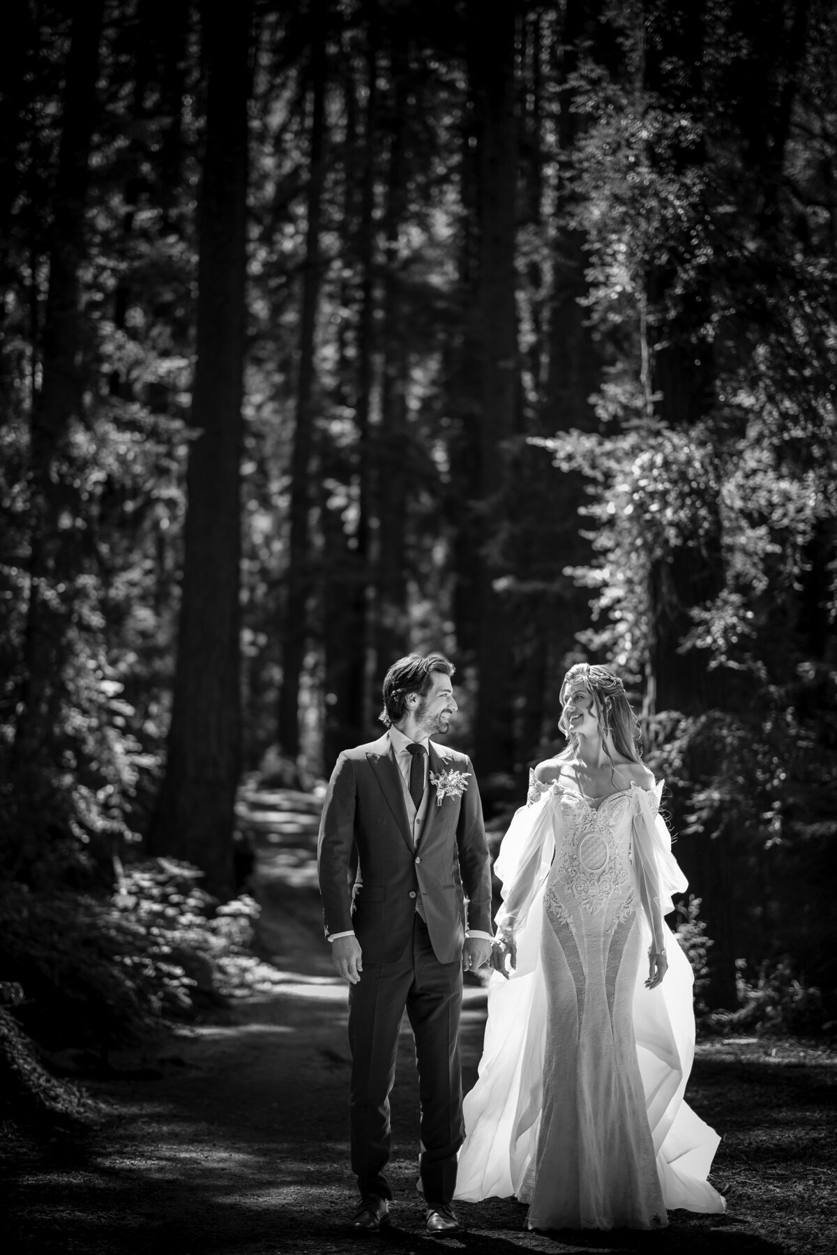 An emotional first look in the woods at a destination wedding at Nestldown in Los Gatos, California