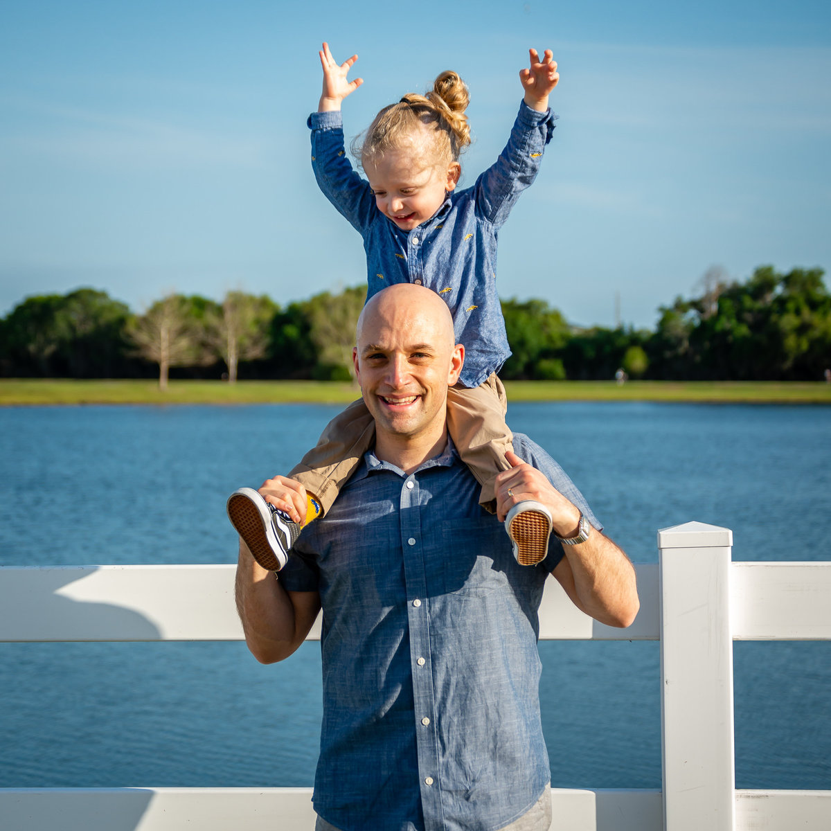 Daddy and Me photo in front of a blue lake