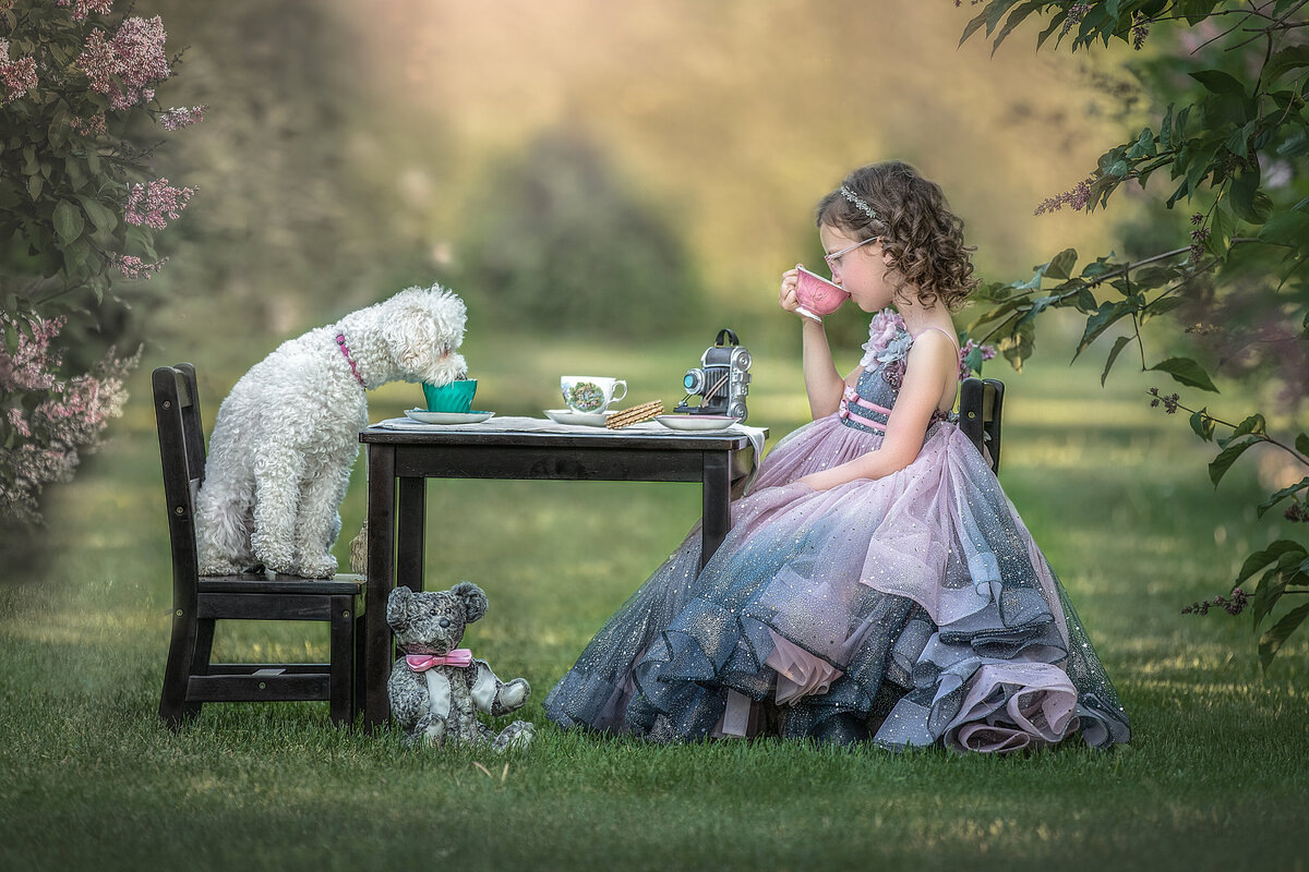 tea [arty of girl and her puppy in the lilacs during her photo shoot in Ottawa  Ontario