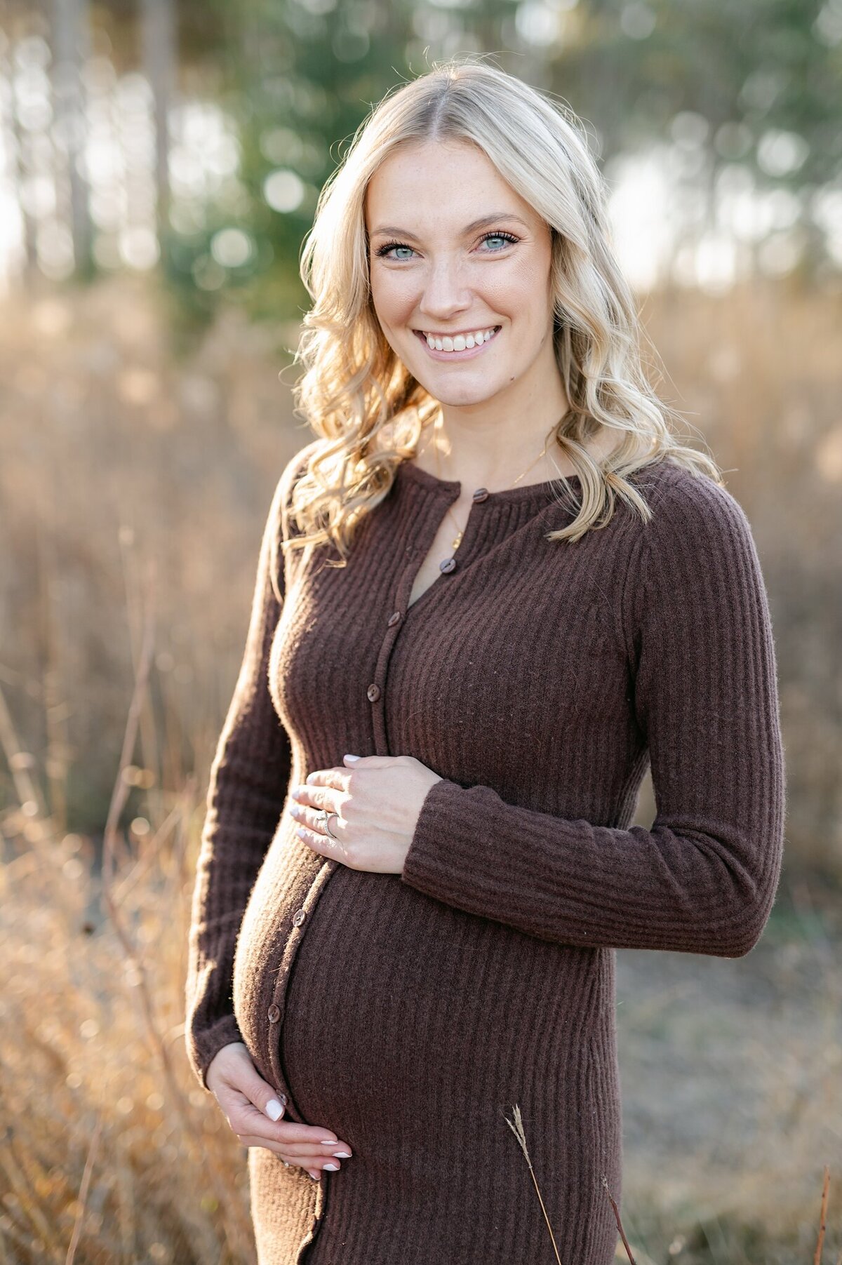 Expecting mother smiling at the camera