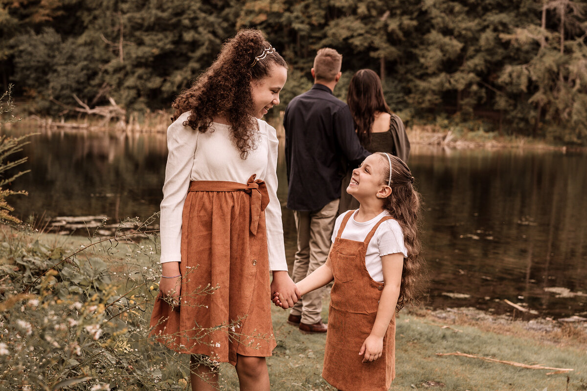 Sisters holding hands