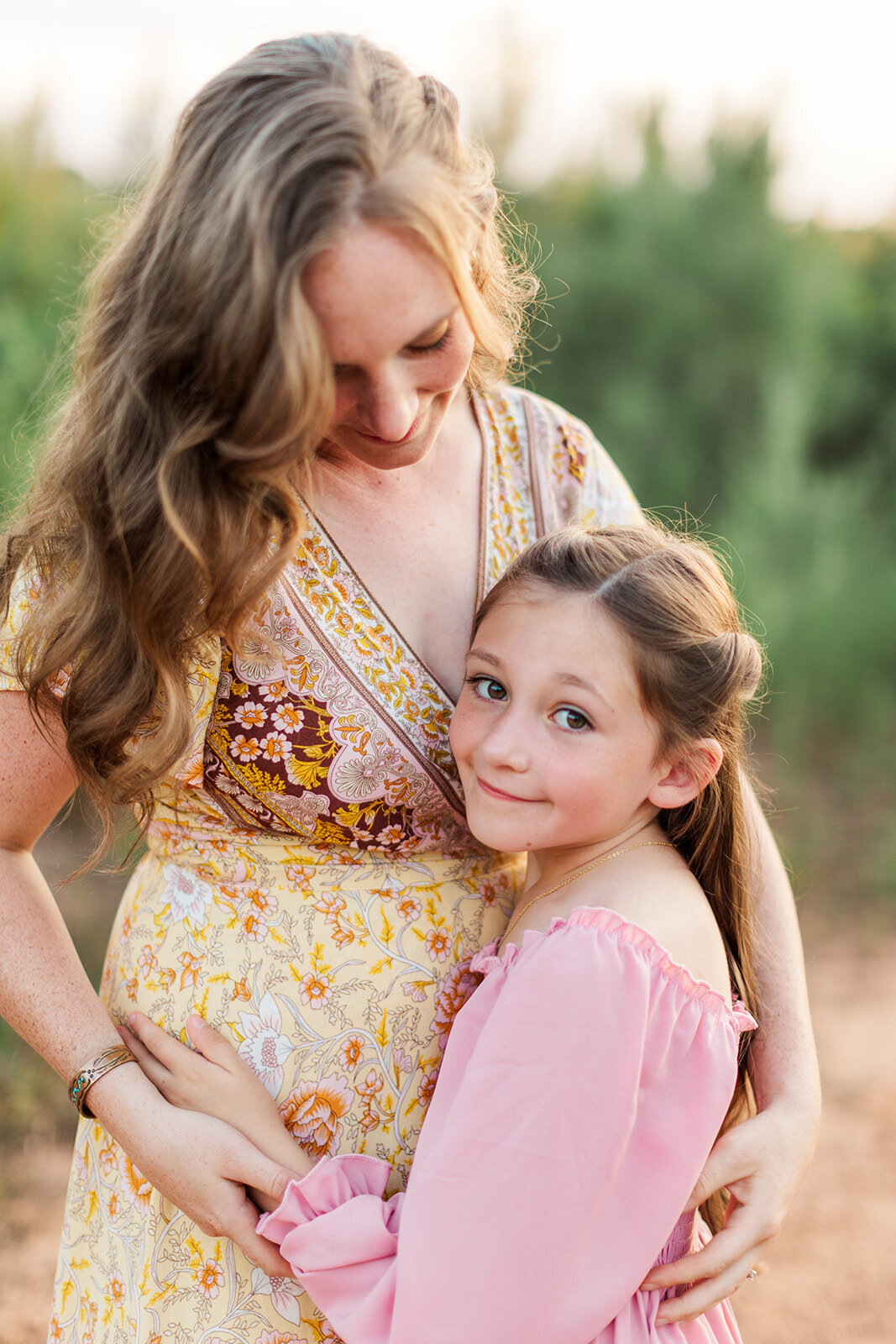 Sunset family session in front of new home in Taylorsville