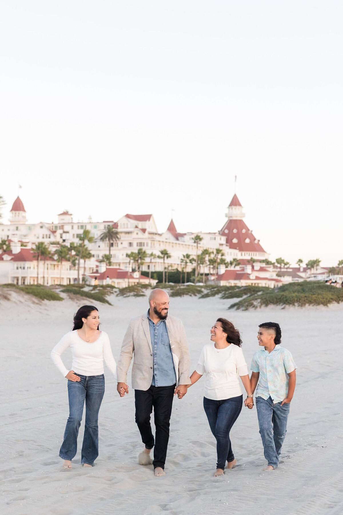 Coronado-Family-Photo-Session-san-diego-family-walking-hotel-del-in-background