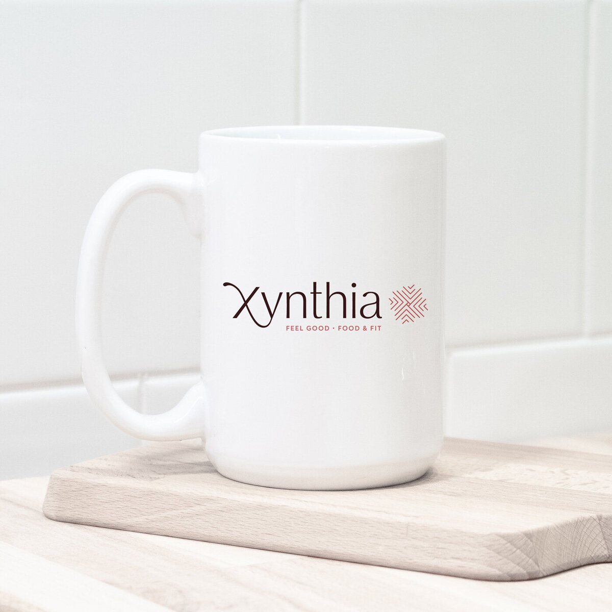 xynthia dietician logo on a coffee mug