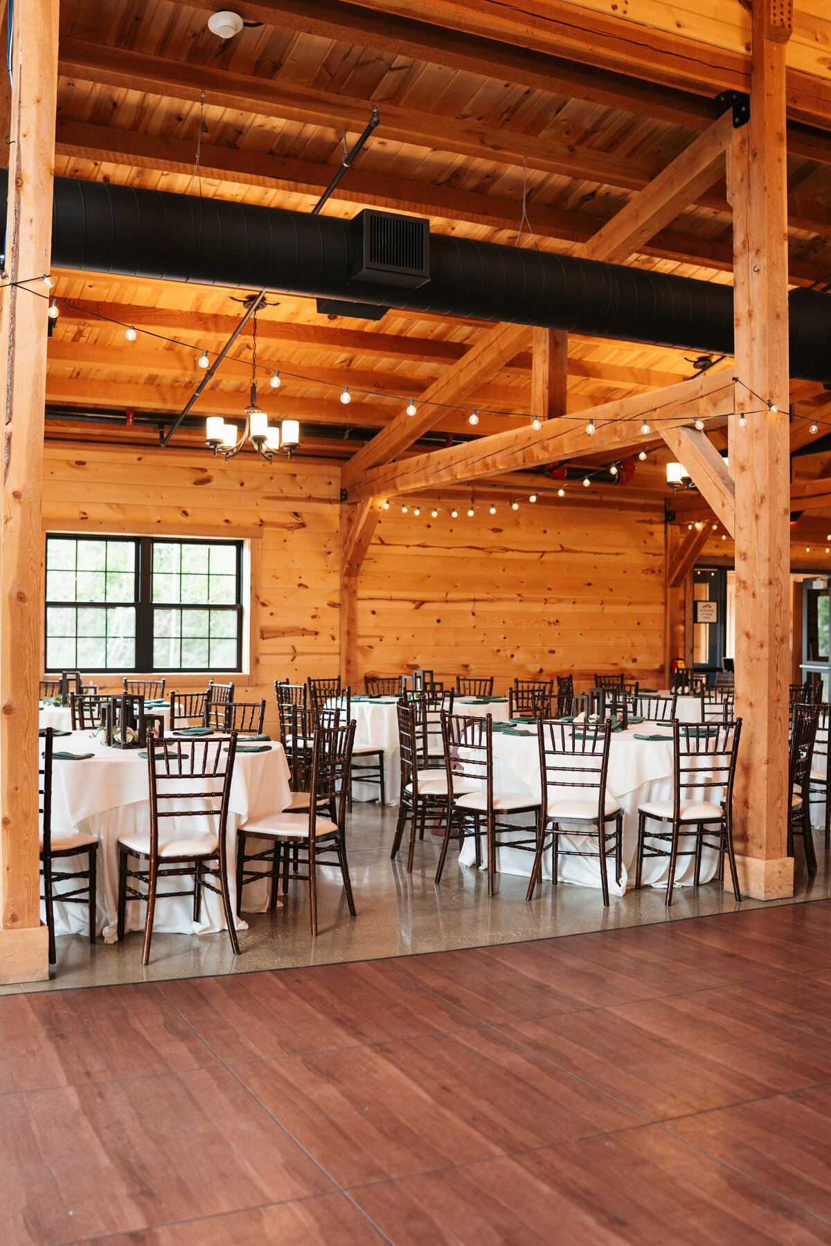 Rustic wedding details with greenery and neutral tones