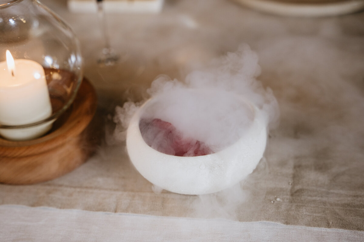 Smoking dessert served under glass dome