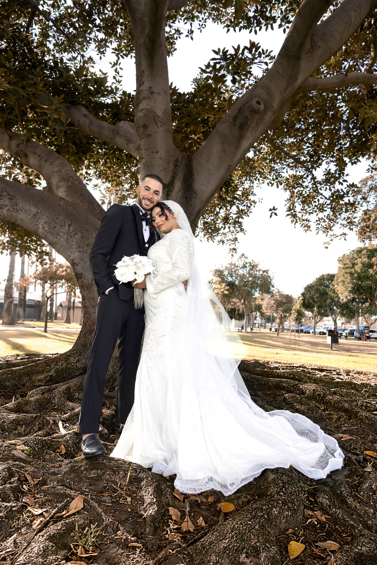 Wedding Portrait Under Tree – Bride & Groom Embracing in Los Angeles