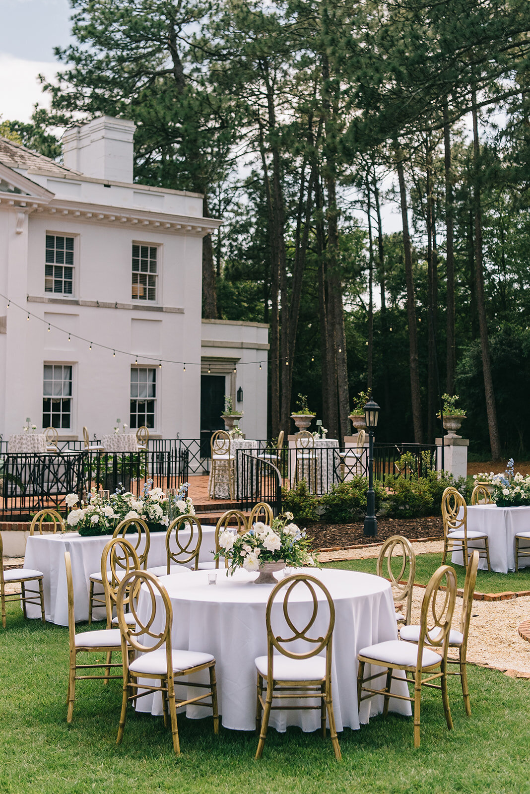 White and blue reception florals designed by Abby Grace Florals at Greenville SC wedding