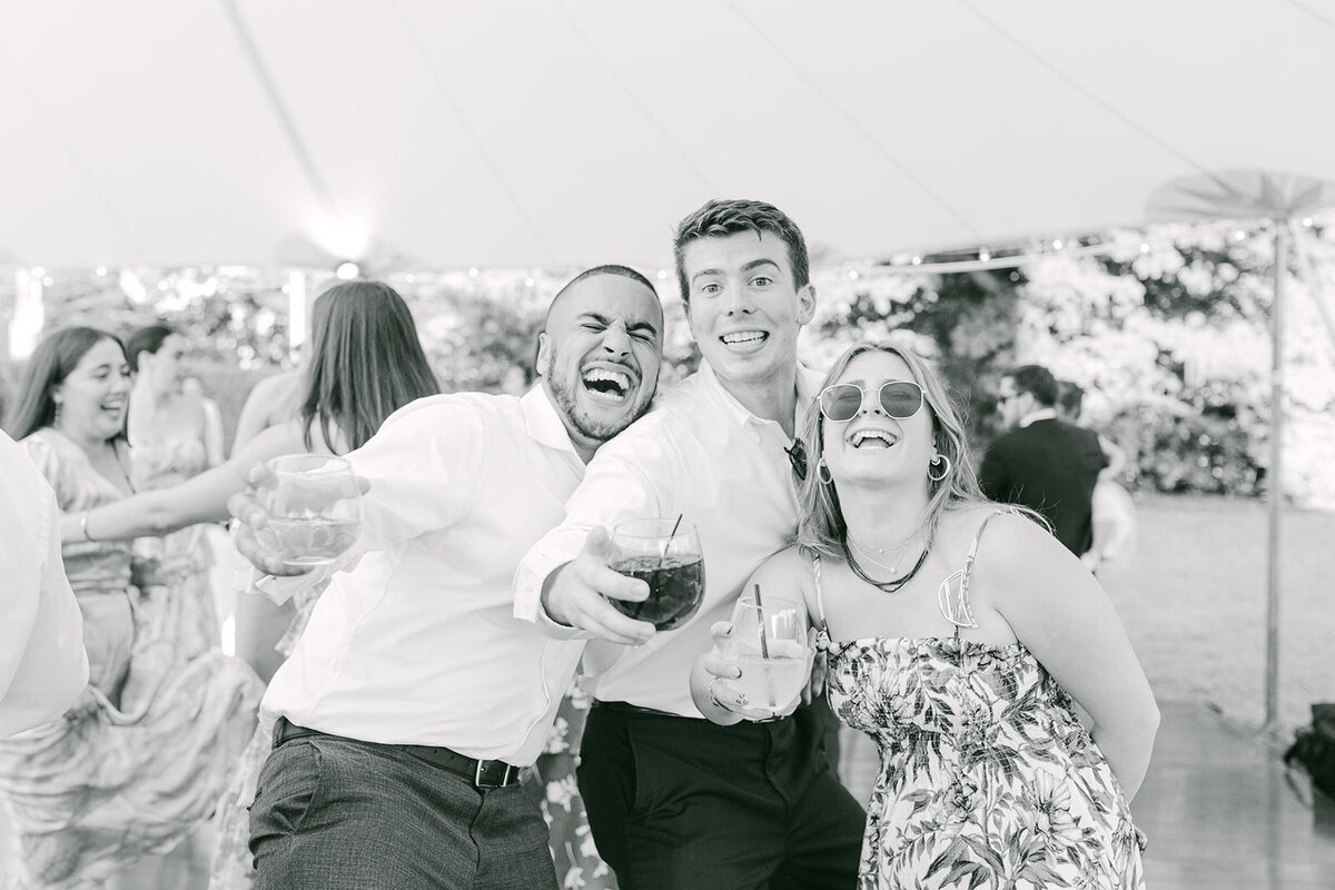 wedding-guests-smile-fun-at-rowayton-library-wedding-ct