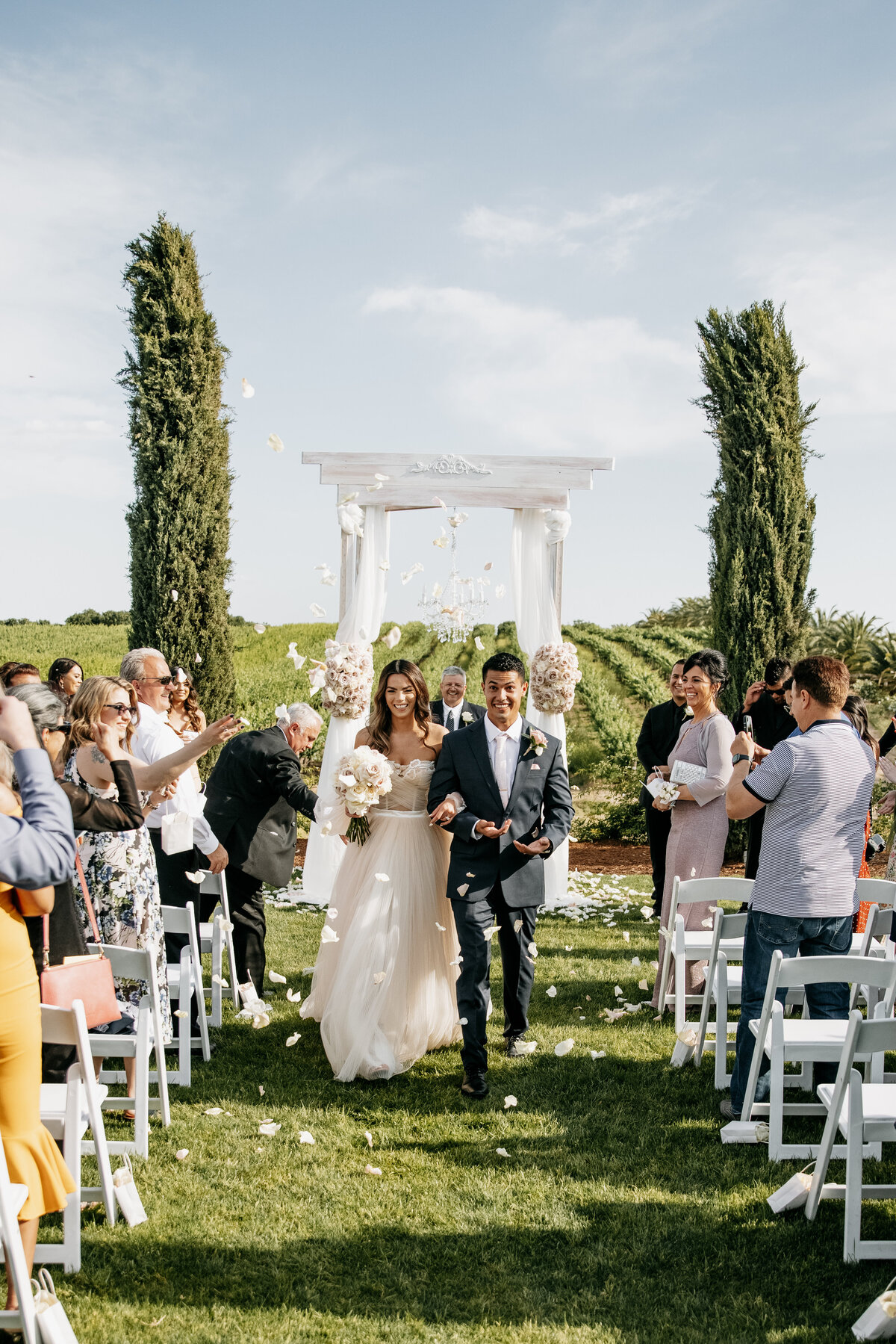 Toca-Madera-Winery-wedding-bride-groom-walking-down-aisle
