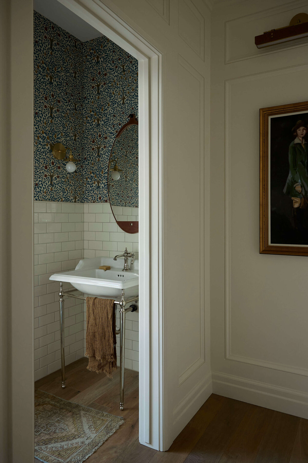 powder-room-with-floral-wallpaper-and-subway-tile