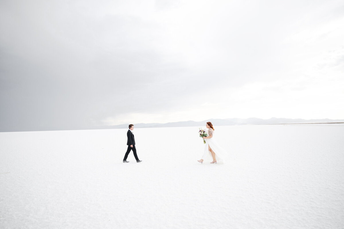 Bride and groom getting married at Canyonlands National Park in Moab Utah at sunset. 