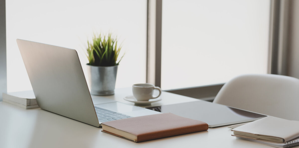 silver-macbook-on-white-table-3740707