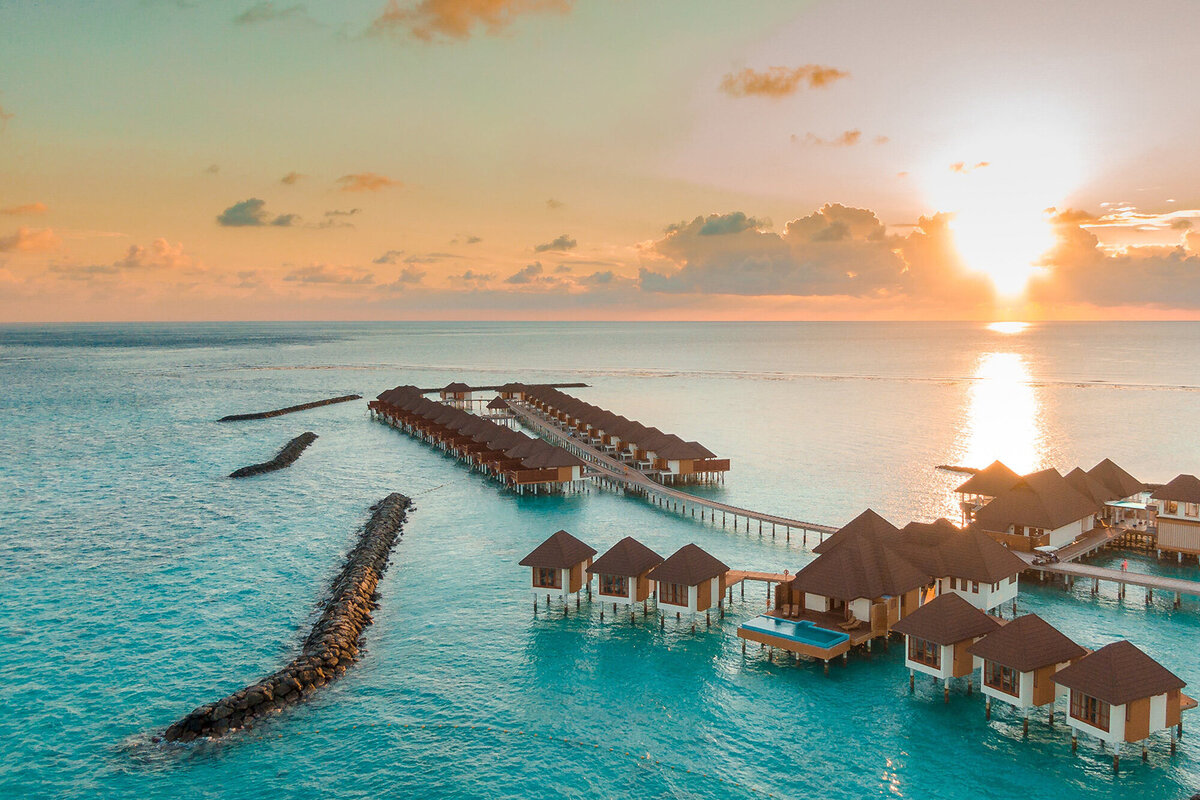 Luxury cabanas over turquoise waters in a tropical location, symbolizing financial freedom, empowerment, and business success. Ataraxis Financial helps business owners demystify finances, gain clarity, and thrive in a financially secure environment with expert bookkeeping and financial strategy.