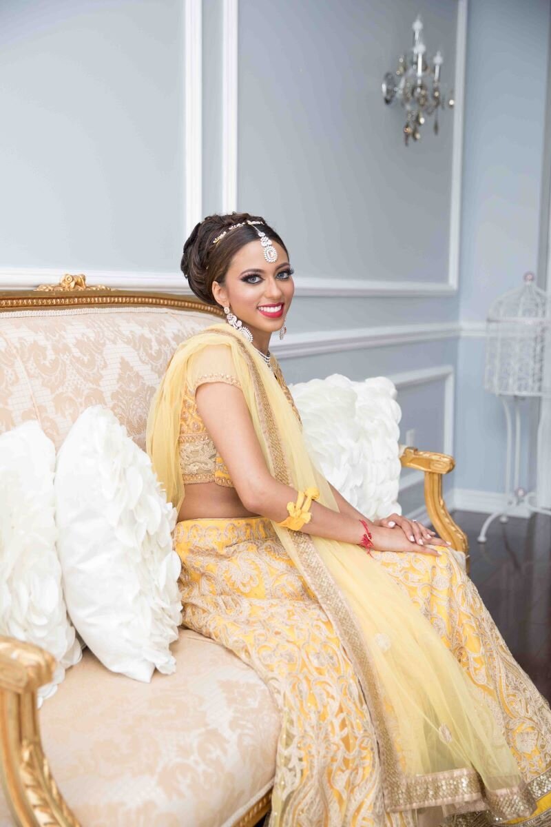 Indian bride's wedding makeup in Ottawa, showcasing a perfect blend of contemporary and traditional styles.