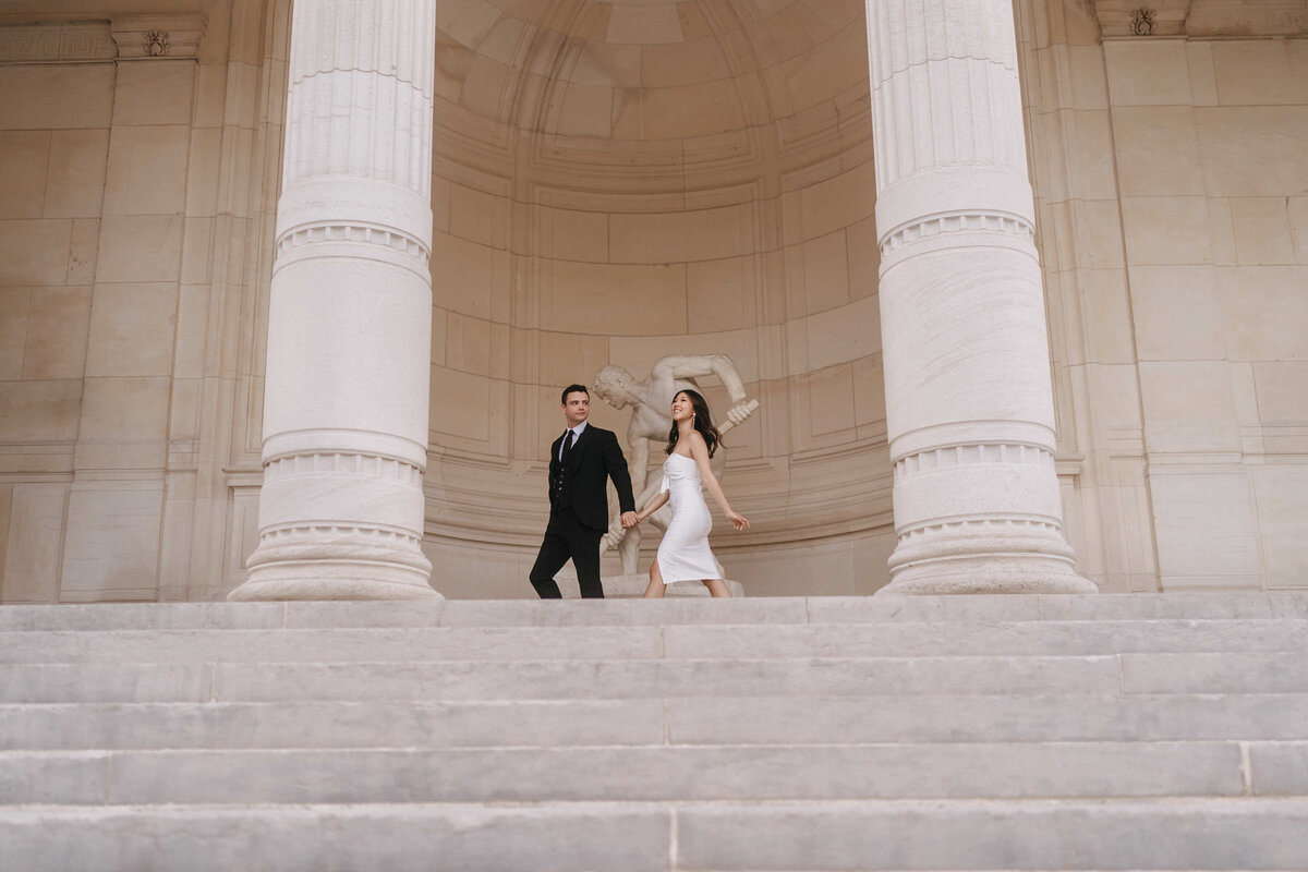 Elegant engagement portraits in Palais Royal garden in Paris
