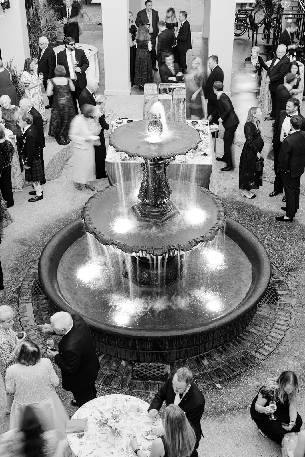 Water fountain with guests at Iron Rose; Mills House Hotel; Charleston, South Carolina