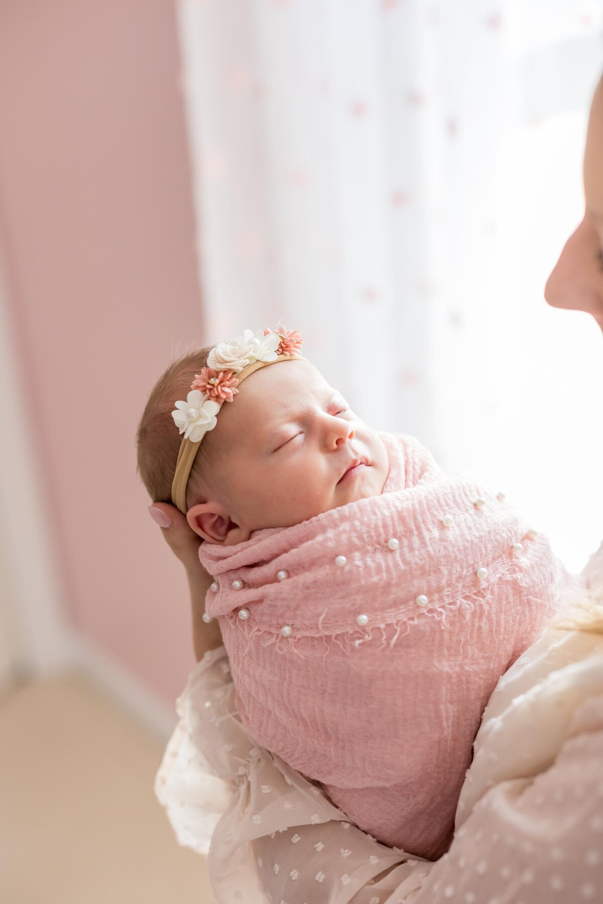 boston at home newborn photo shoot with baby girl pink