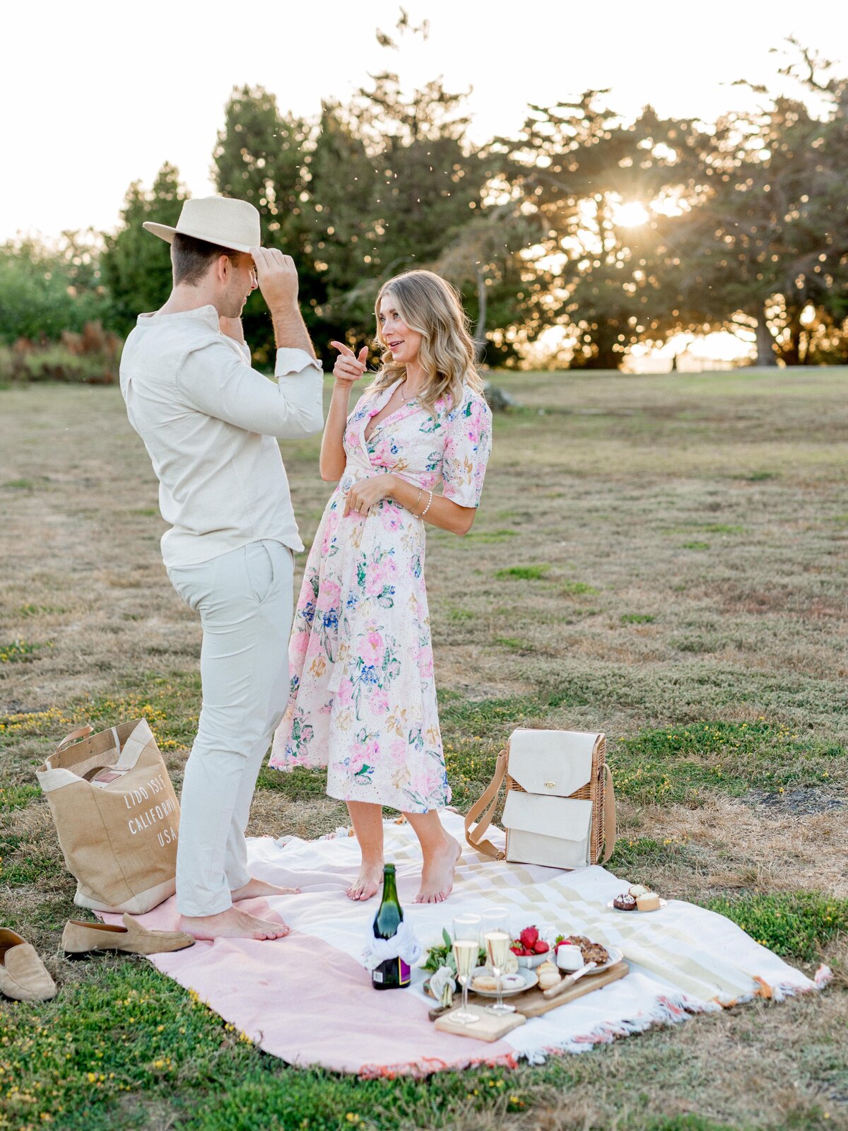 Playful sunset picnic engagement in San Luis Obispo—romantic, barefoot, and full of personality.
