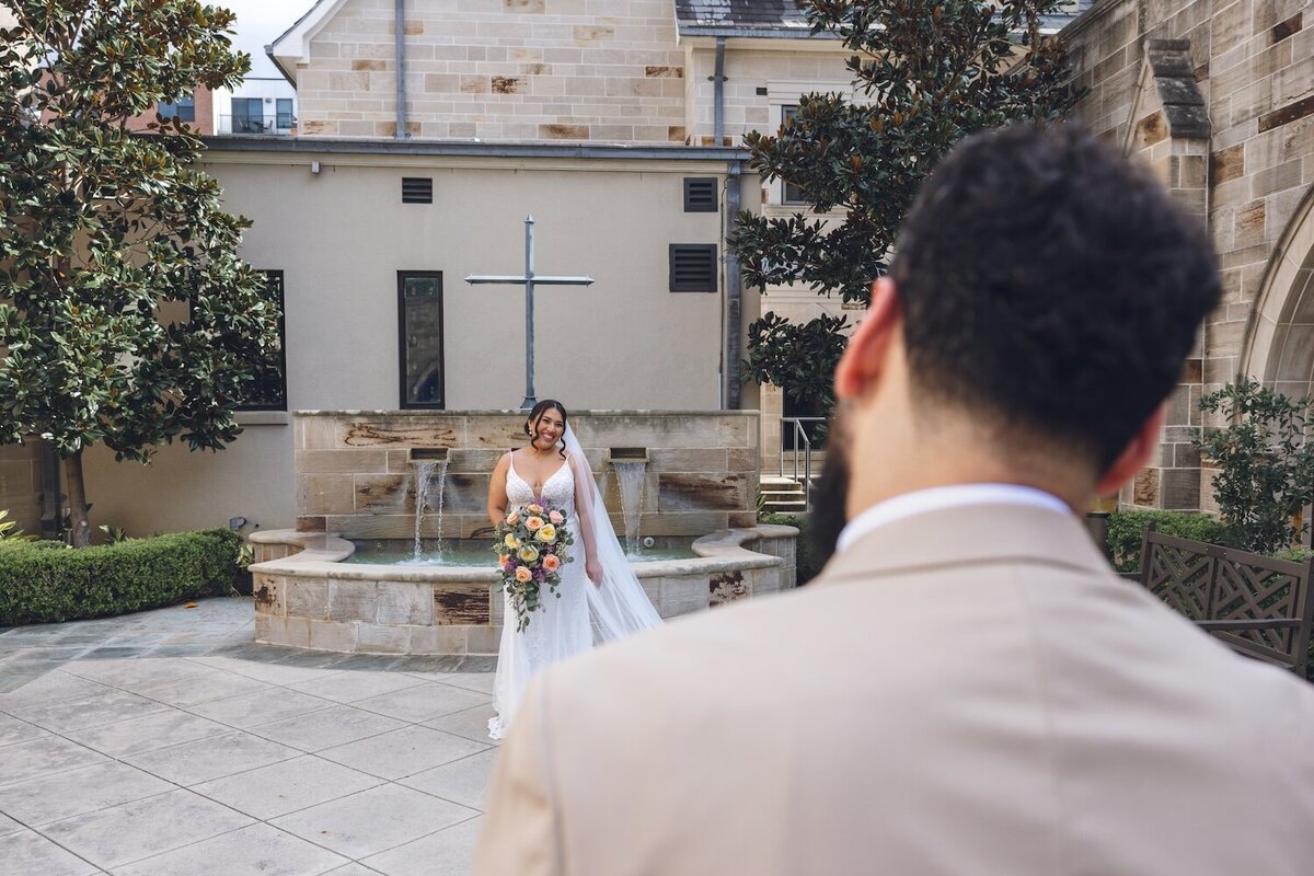 Groom's emotional reaction to bride during first look