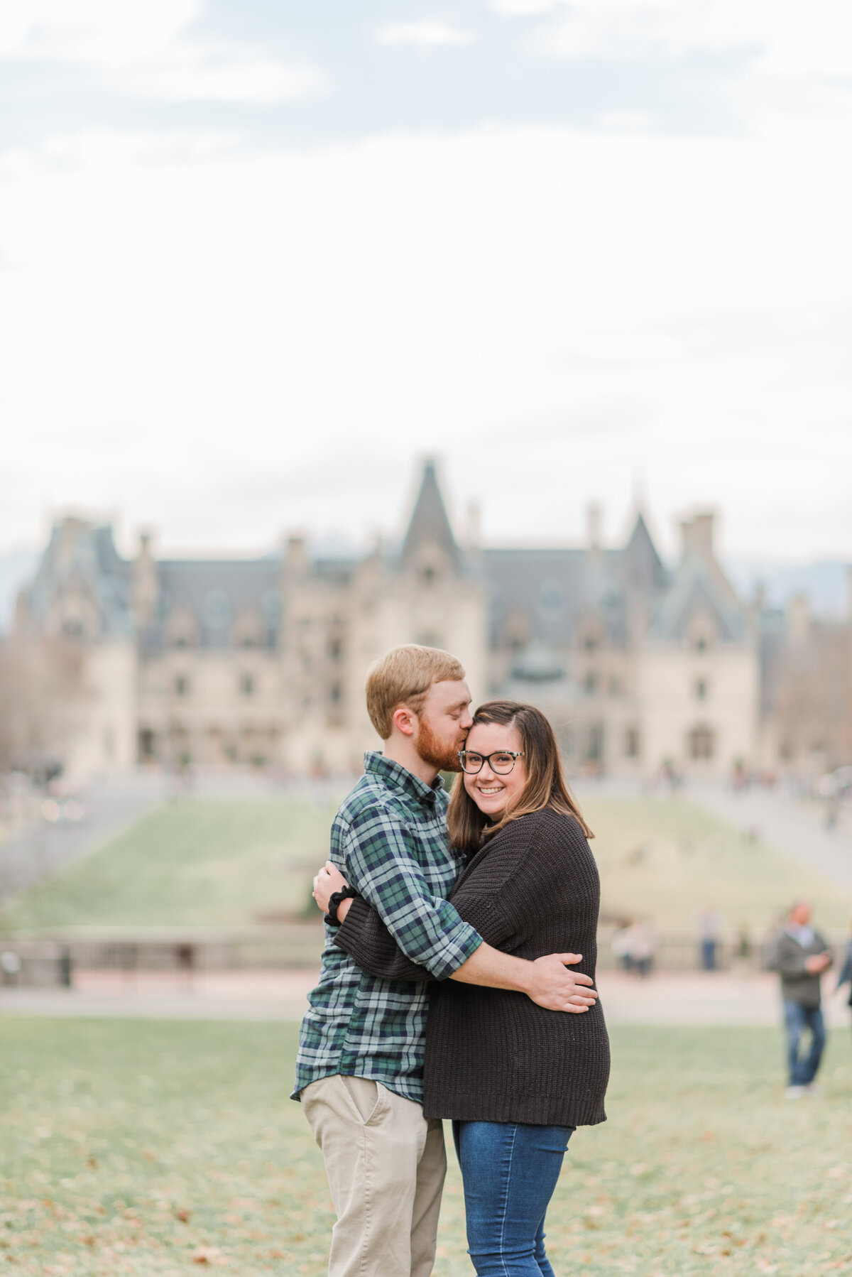 Couple hugging during their engagement session at the Biltmore Estate portraits