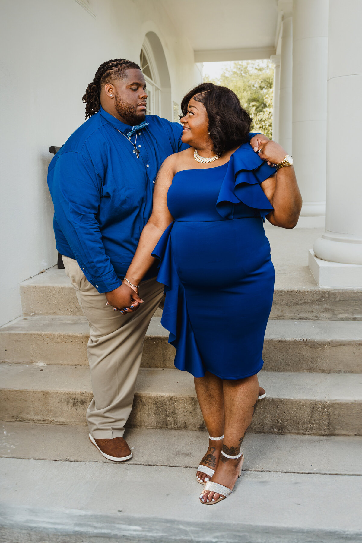 Couple look at one another during their portrait session