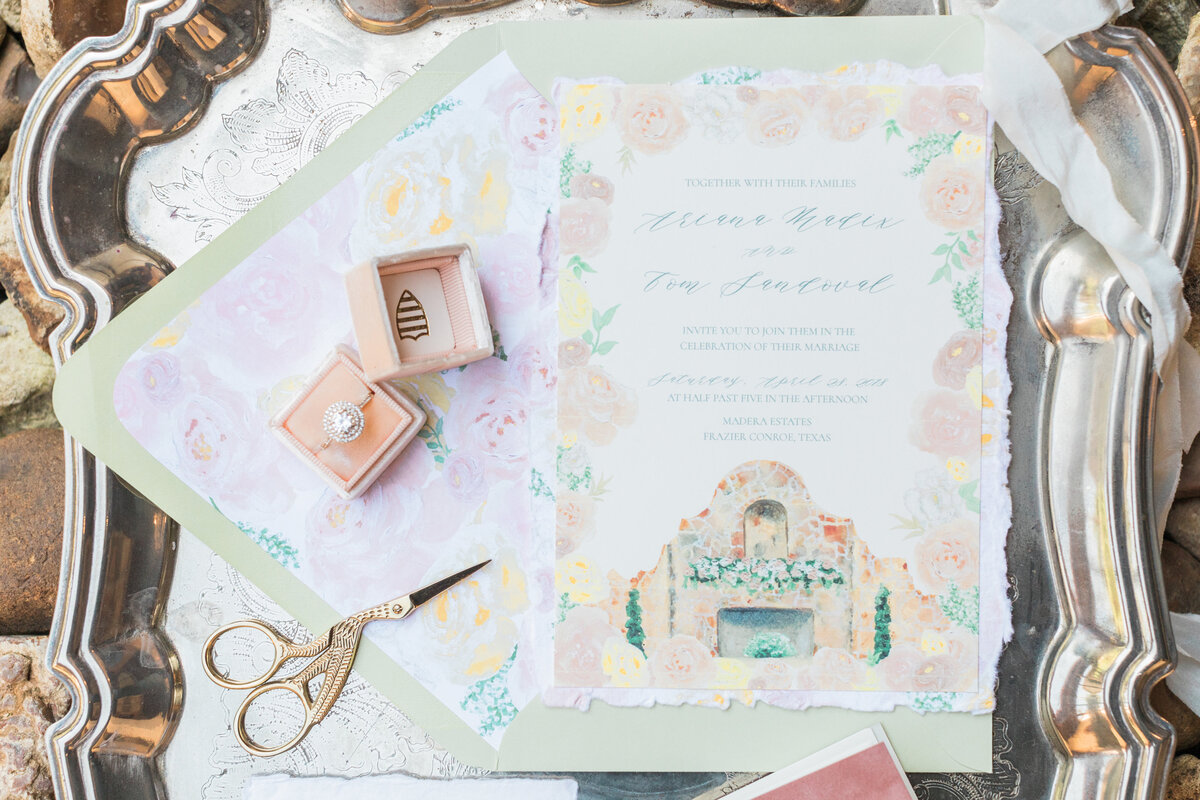 Wedding invitation with wedding venue featured on front