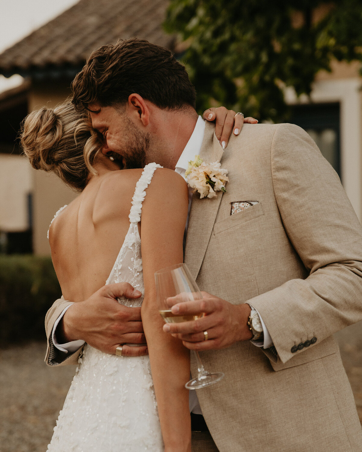 Bride and Groom kiss during their wedding photos at Chateau Canet in Carcassonne.